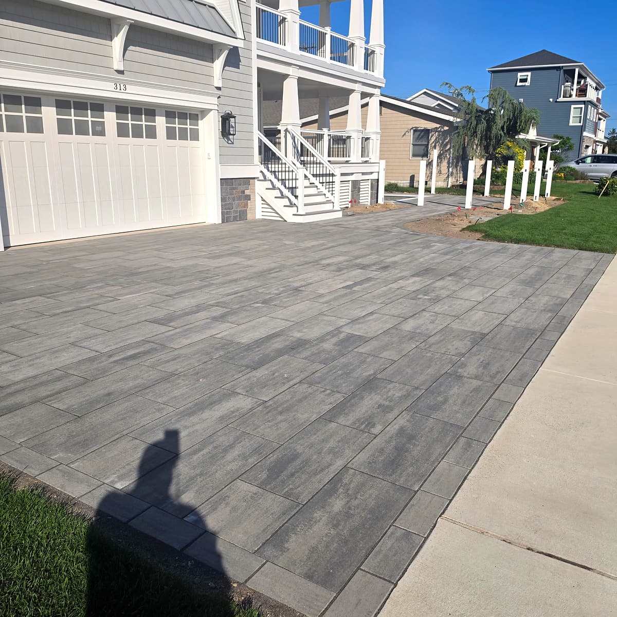 Large-format paver driveway at a shore home
