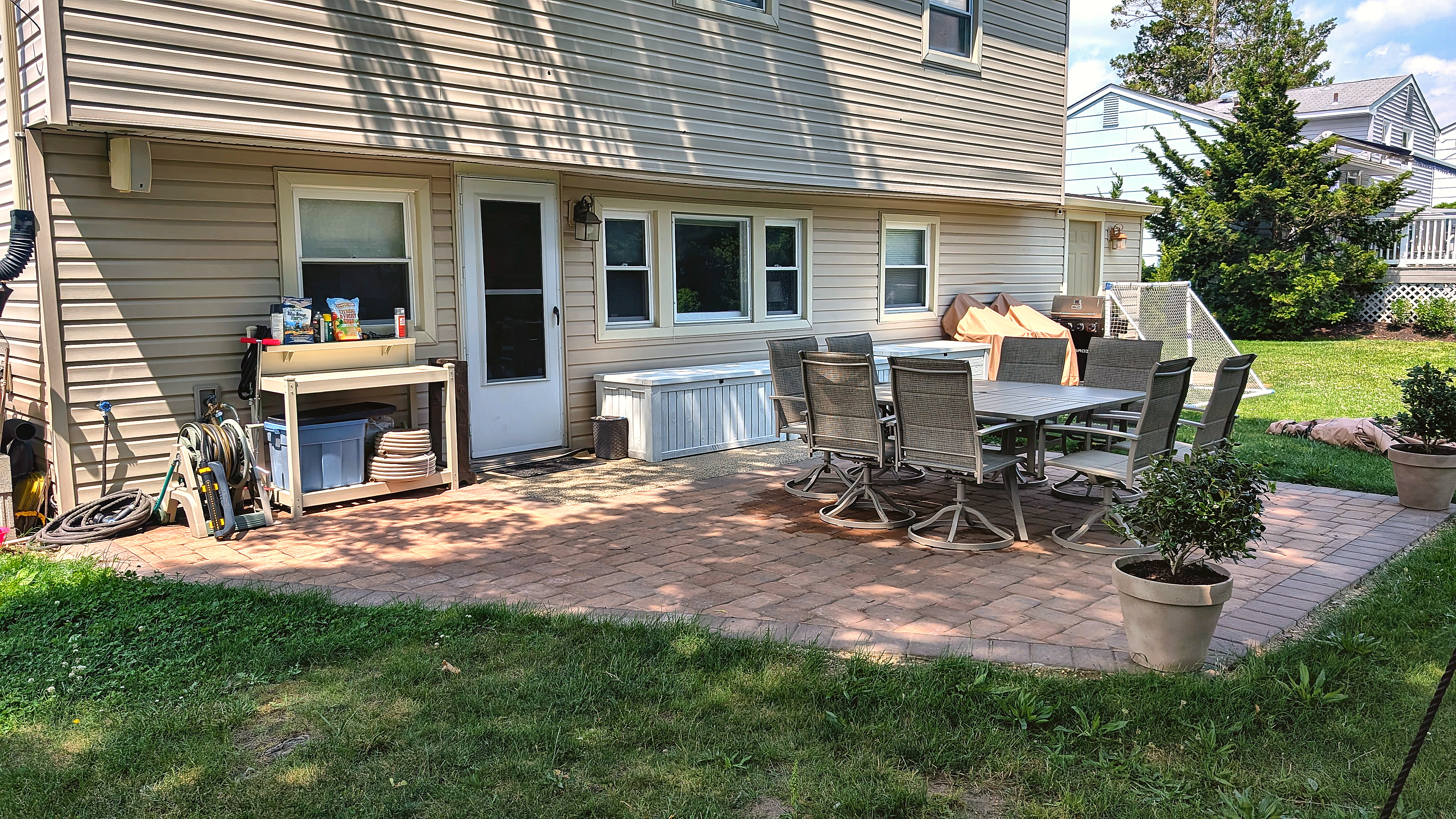 Paver patio and walkway connecting to the back door of a South Jersey home